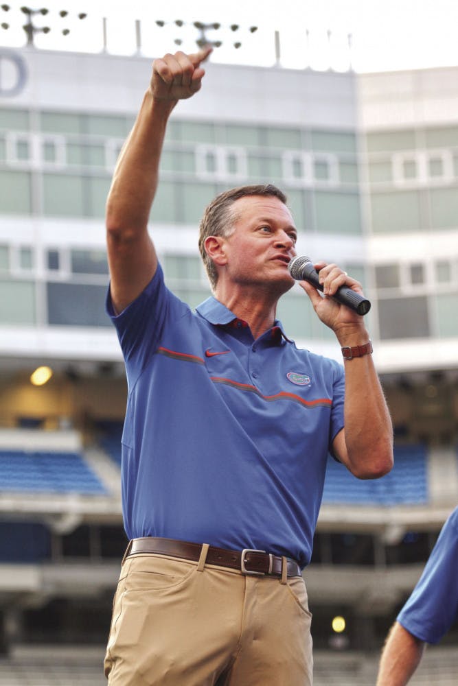 Scott Stricklin, 47, the UF athletic director, points to the audience in attendance, saying that without the support of the UF Student Body, the Gators’ athletic success wouldn’t be possible.