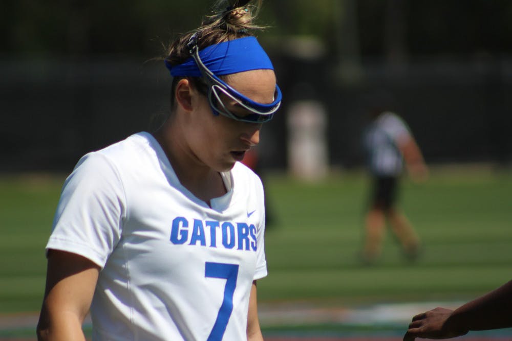 Senior attacker Shayna Pirreca celebrated senior day with her team and classmates at Dizney Stadium on Saturday. Pirreca scored three goals in Florida's 23-3 victory over Butler. 