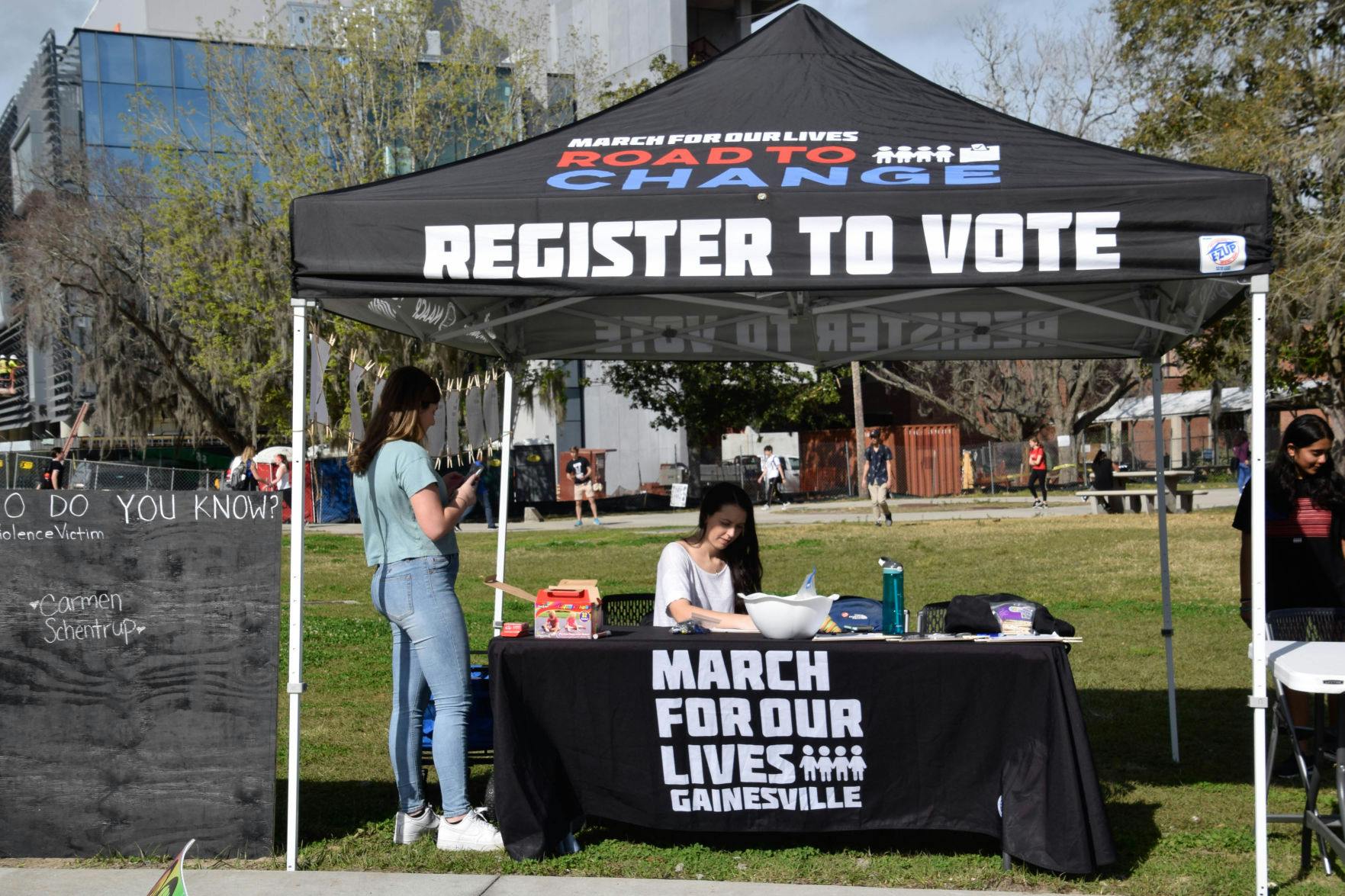 March for Our Lives Gainesville tabled near the Reitz Union on Tuesday to help students register to vote.