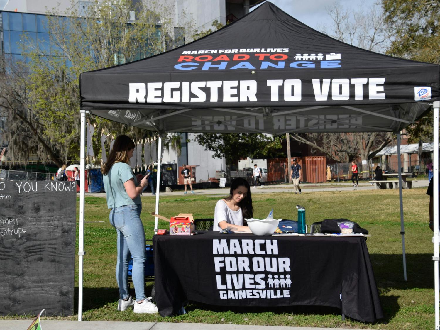 March for Our Lives Gainesville tabled near the Reitz Union on Tuesday to help students register to vote.