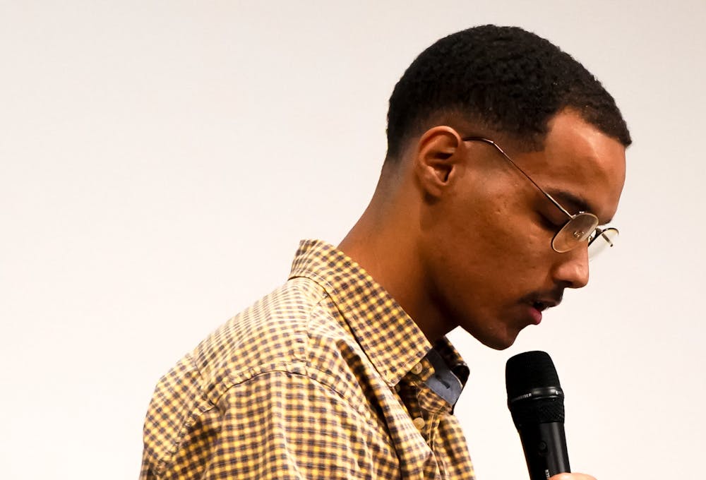 Ameer Jackson reads a poem from his book 'From a Moth to a Butterfly' during the Celebration of Black, Love, Art and Poetry event at Santa Fe college on Feb. 16, 2025.