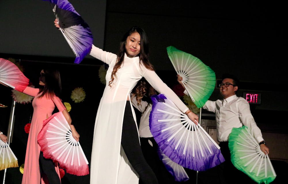 <p>The Vietnamese Student Organization’s traditional dance group waved their fans for their performance on Saturday night for the organization's “Tết” celebration, or the Vietnamese New Year. They also performed with umbrellas and bamboo hats as part of the holiday tradition.</p>