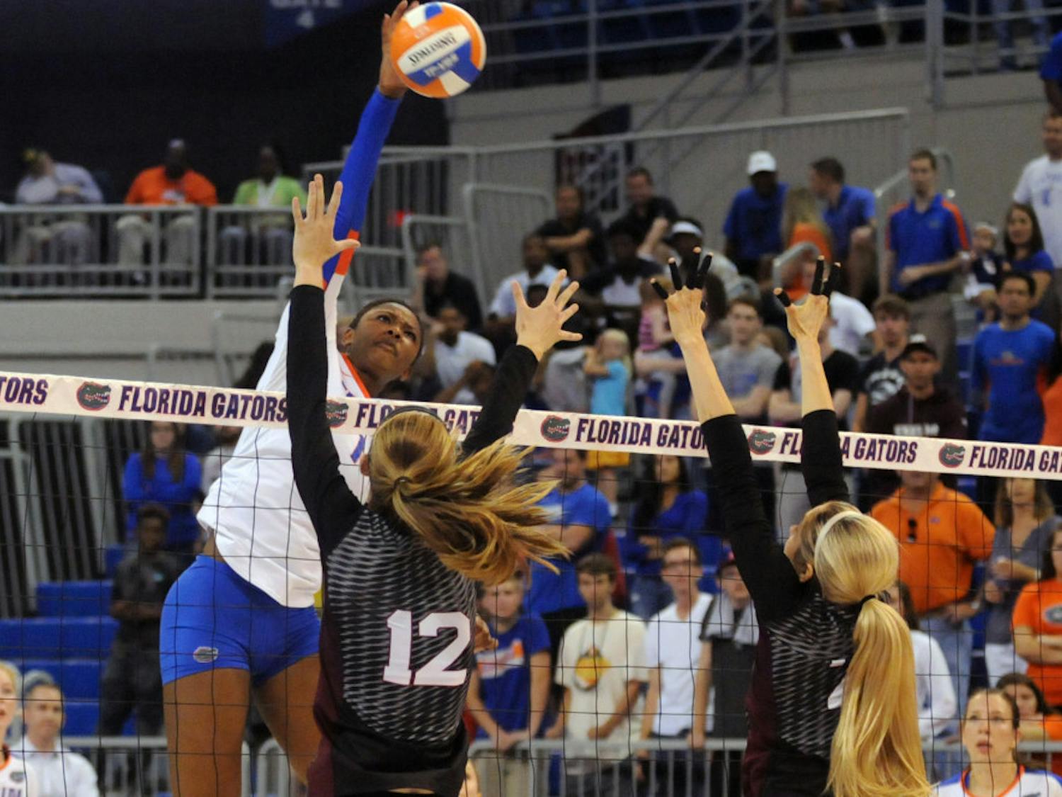 UF middle blocker Rhamat Alhassan swings for a kill during Florida's 3-0 win against Texas A&M on Oct. 9, 2015, in the O'Connell Center.