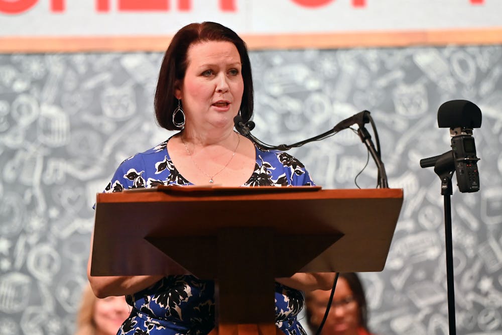 <p>Karen Kearney speaks at the Teacher of the Year Ceremony after winning Teacher of the Year for Alachua County.</p>