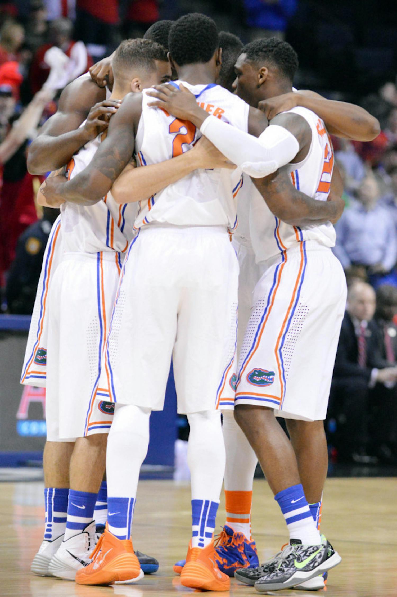 Florida’s starters huddle prior to the start of Florida’s win over Dayton on March 29 in FedExForum in Memphis, Tenn.
