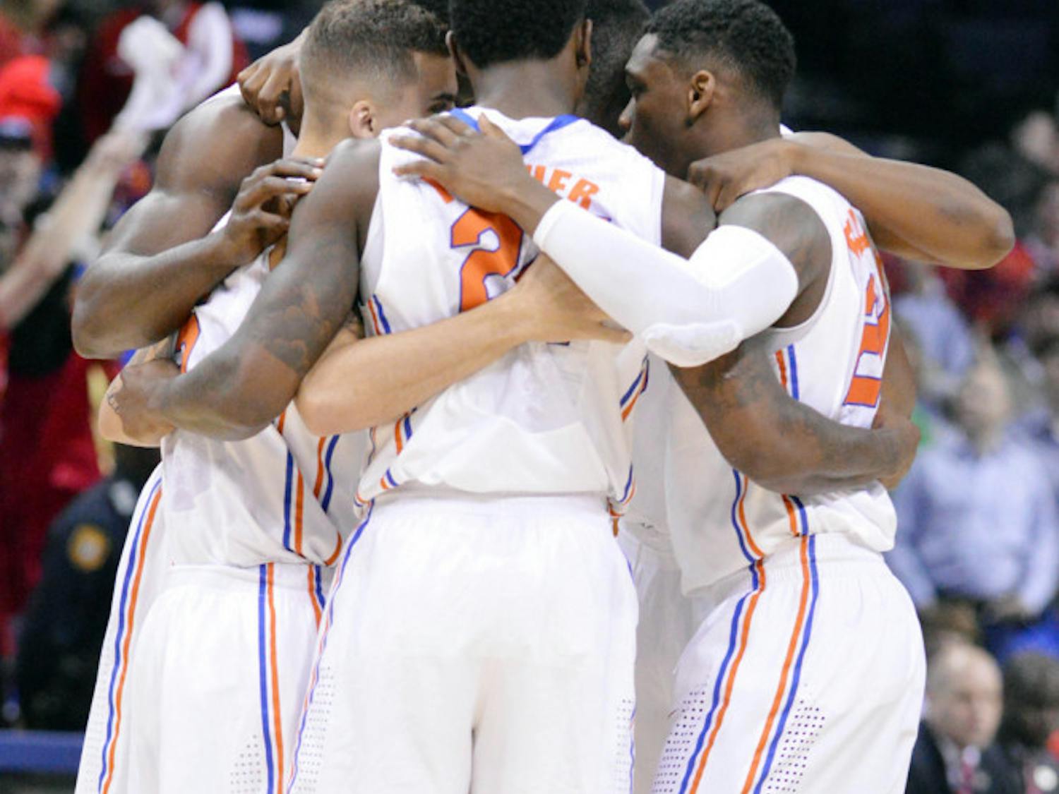Florida’s starters huddle prior to the start of Florida’s win over Dayton on March 29 in FedExForum in Memphis, Tenn.