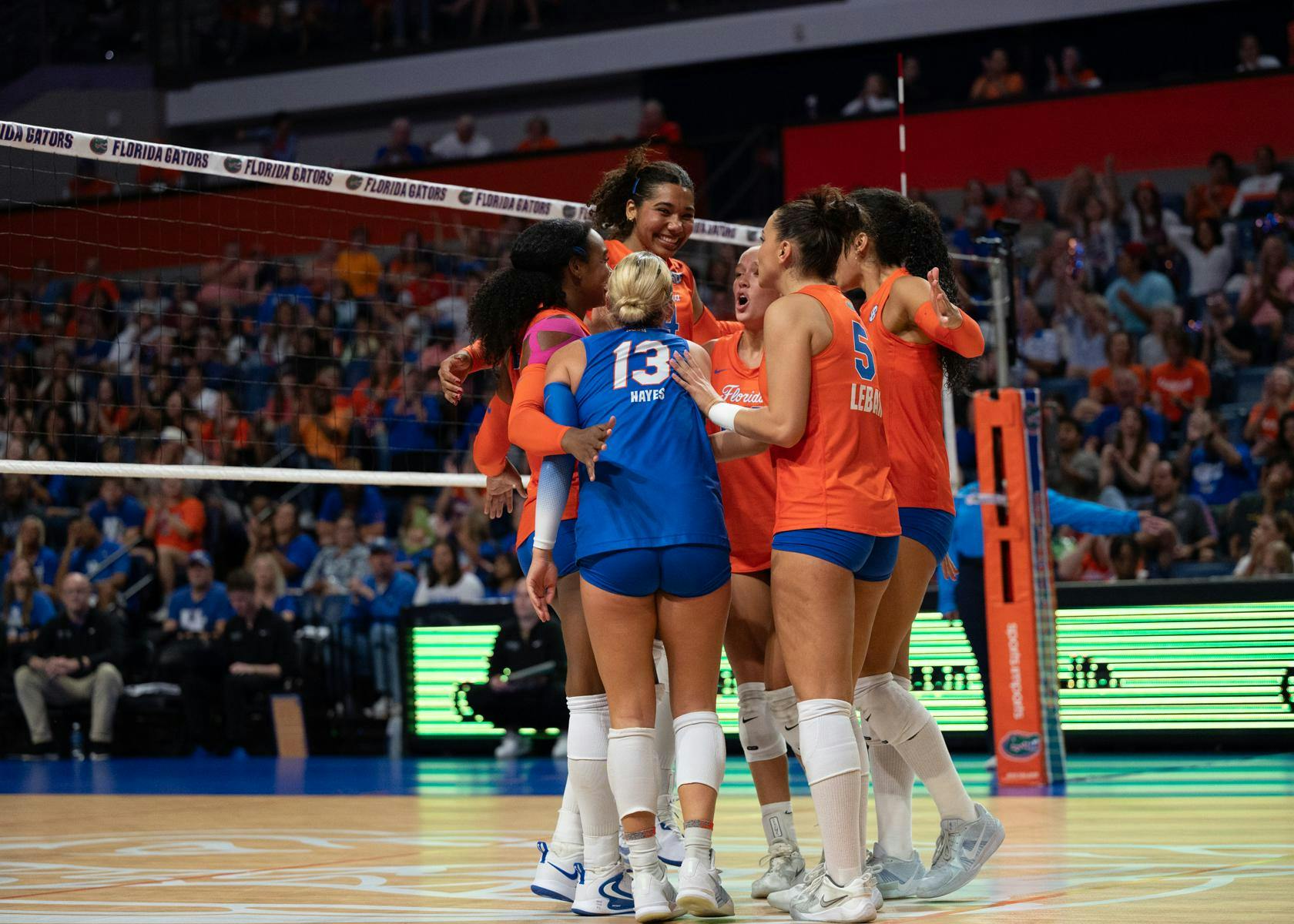 Florida libero Lily Hayes (13) celebrates with her teammates during an NCAA volleyball game against Kentucky, Sunday, Oct. 4, 2026, in Gainesville, Fla.