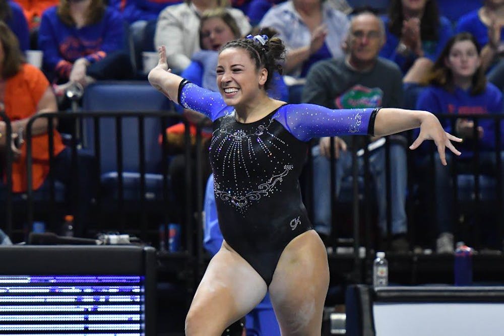 <p>UF gymnast Amelia Hundley performs a routine during Florida's win against Georgia on Feb. 10, 2017, in the O'Connell Center.&nbsp;</p>