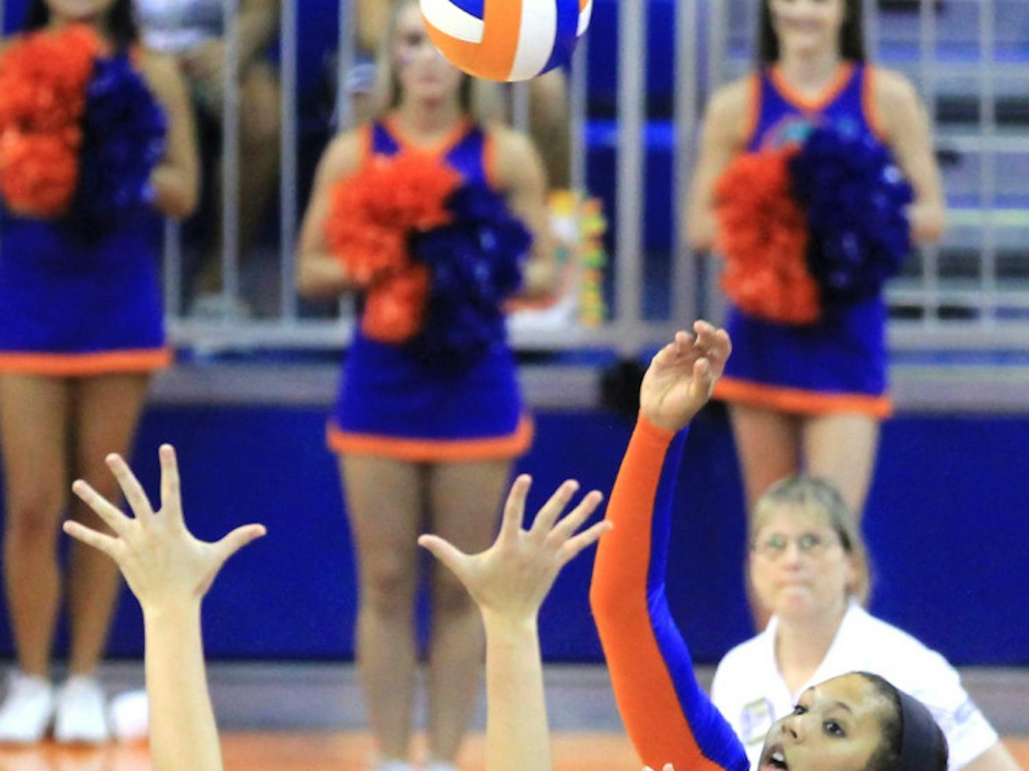 Freshman Berkley Whaley sends the ball over the net during Florida’s 3-0 win against FGCU on Aug. 25 in the O’Connell Center.
