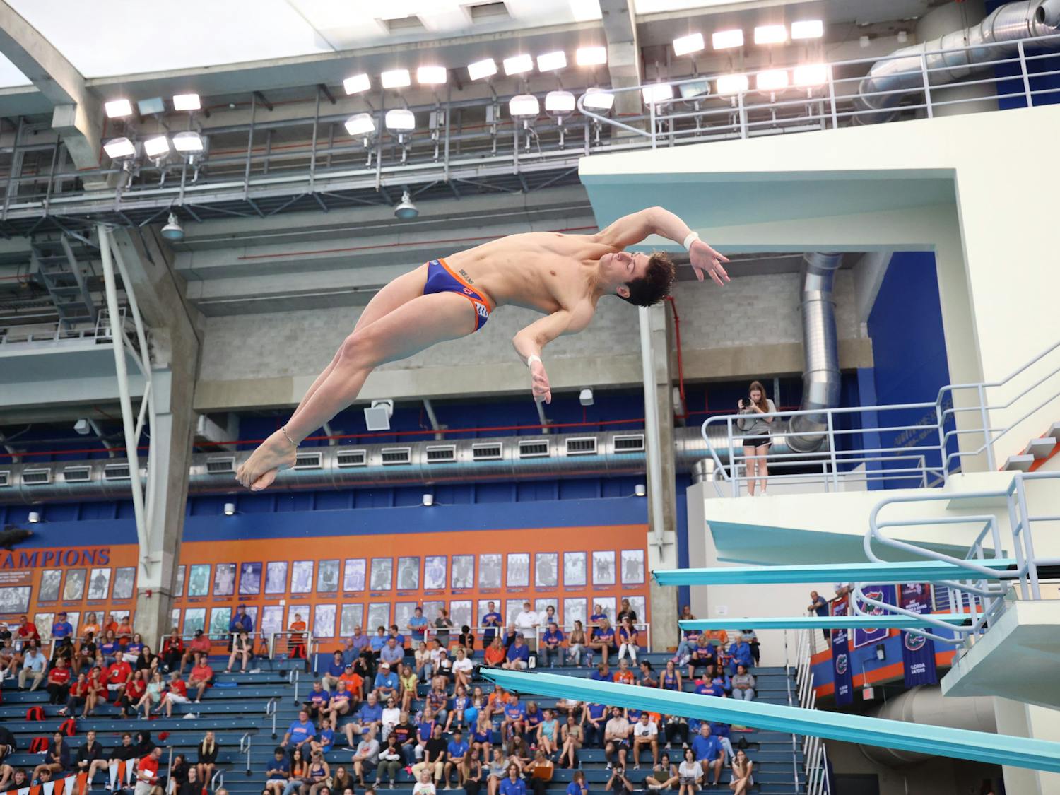 Senior diver Skip Donald begins his dive during the Gators' meet against the Georgia Bulldogs on Friday, October 27, 2023, at the Stephen C. O'Connell Center Natatorium in Gainesville, Florida.