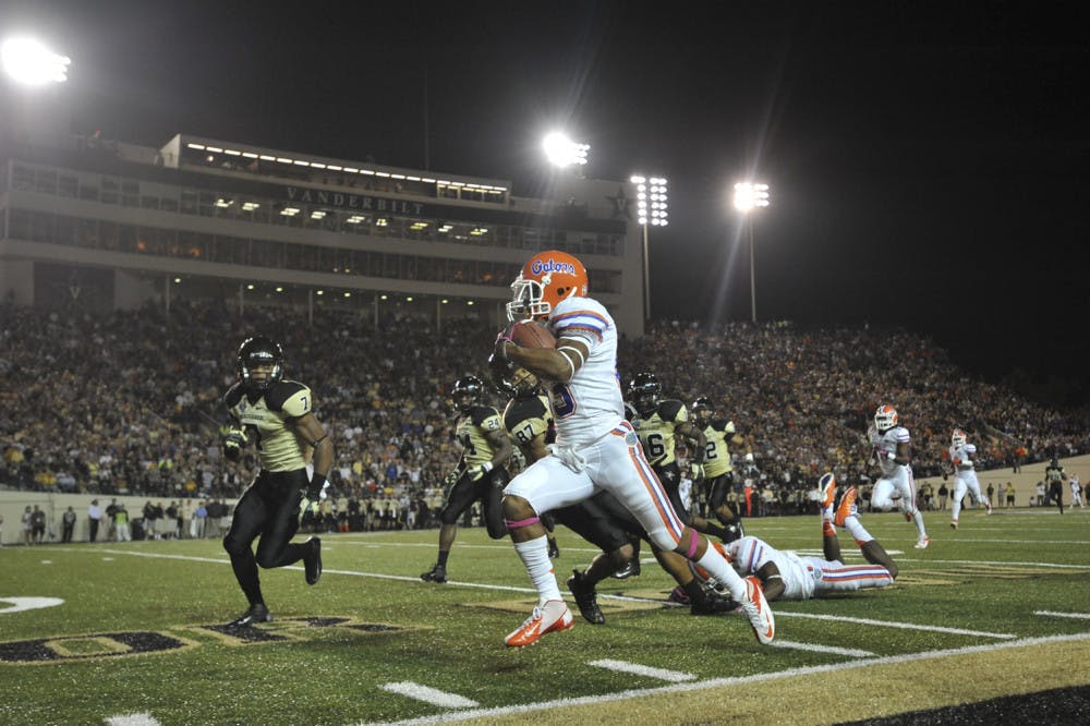 <p>Florida wide receiver Solomon Patton runs the ball for 54 yards to execute a fake punt on a 4th-and-5 against Vanderbilt in the third quarter on Saturday.</p>