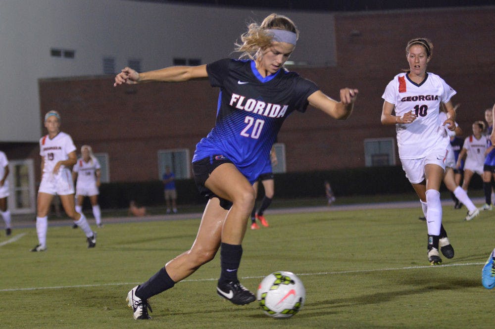 <p>Christen Westphal dribbles the ball during Florida's 2-1 win against Georgia at James G. Pressly Stadium.</p>