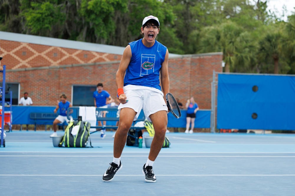 Florida tennis player Andreas Timini celebrates a point during an NCAA tennis match against Vanderbilt, Thursday, April 2, 2026, in Gainesville, Fla.