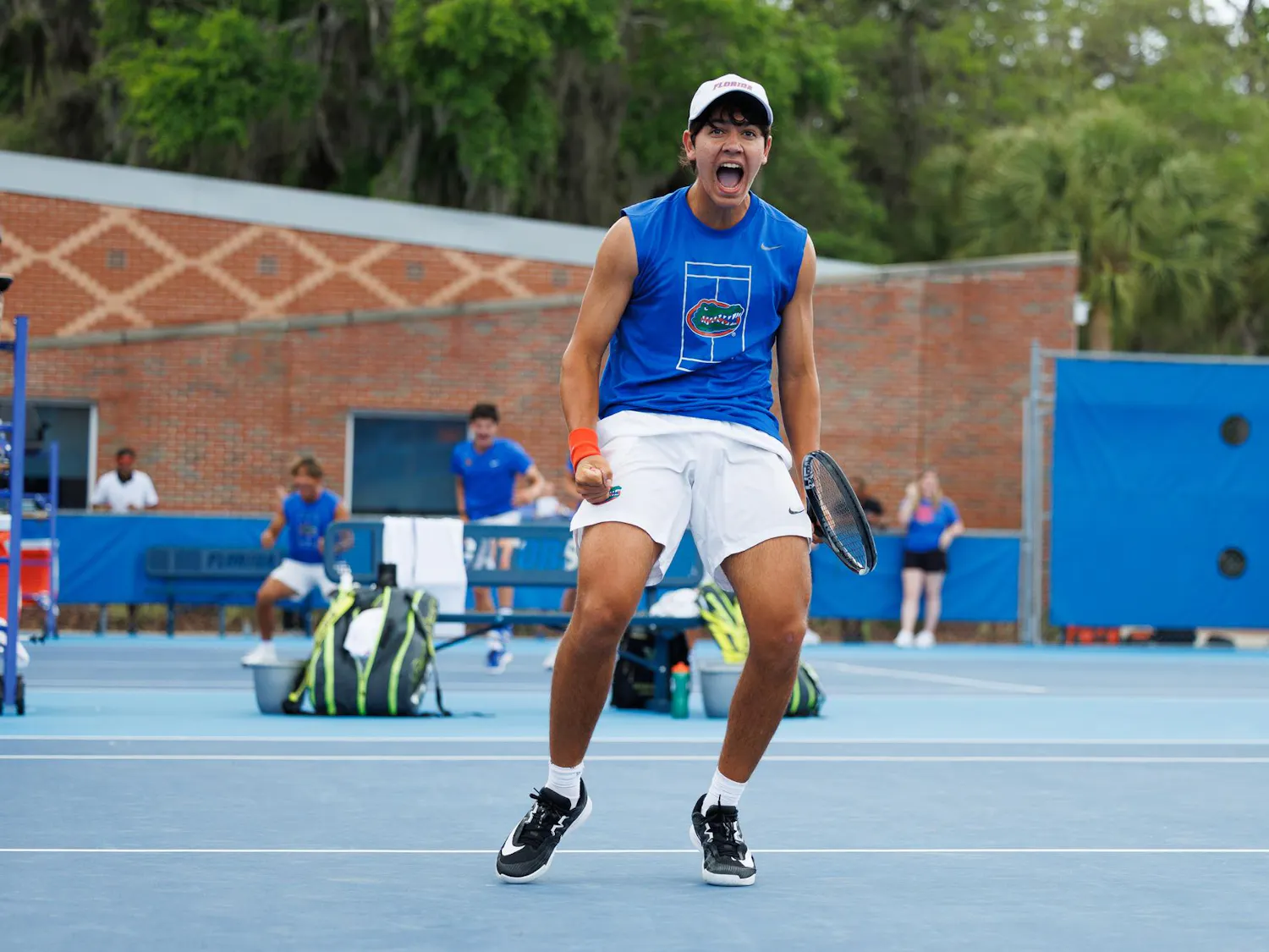 Florida tennis player Andreas Timini celebrates a point during an NCAA tennis match against Vanderbilt, Thursday, April 2, 2026, in Gainesville, Fla.