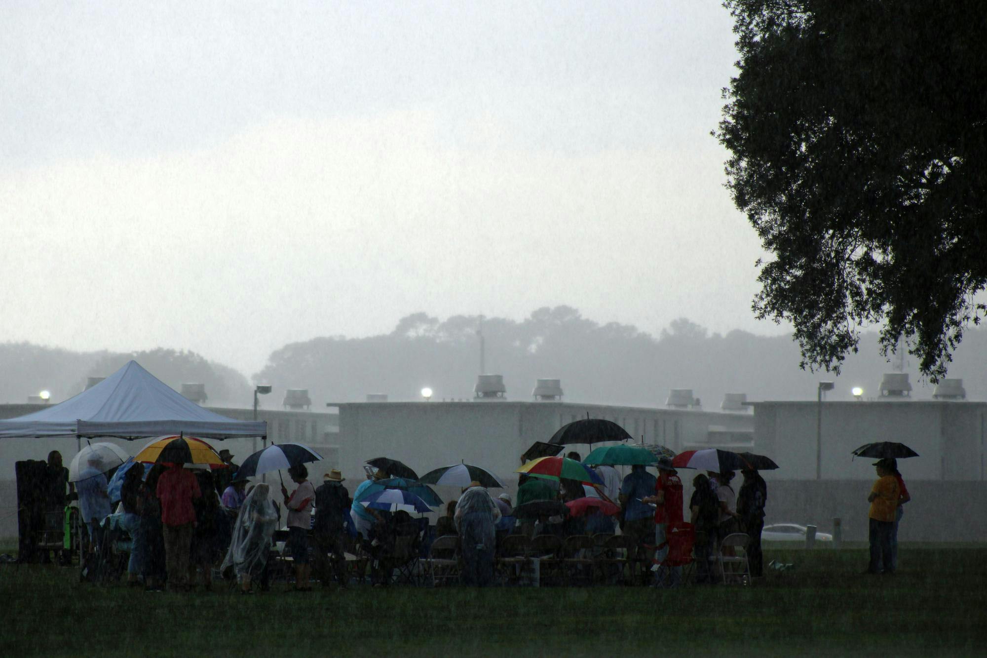 Protestors stand together in the rain in opposition of the execution of Richard Knight. Knight was executed at the Florida State Prison in Raiford on Thursday, May. 21, 2026.