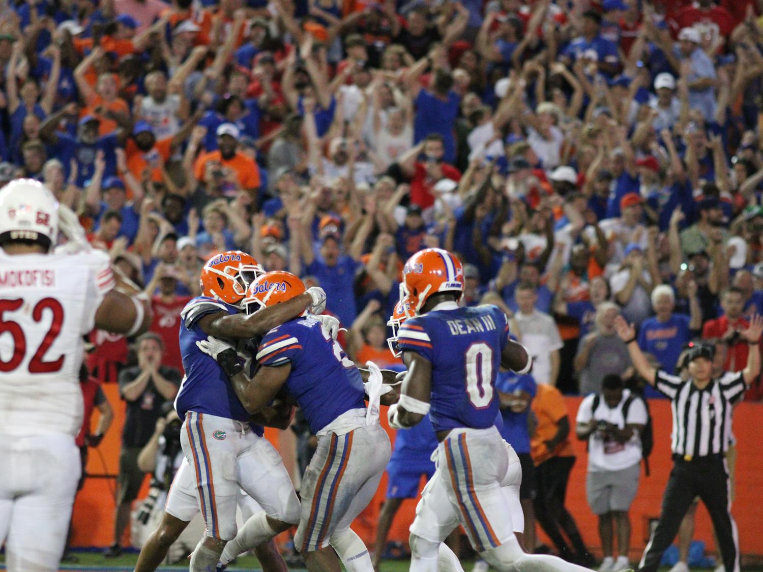 Florida senior linebacker Amari Burney celebrates with his defensive teammates after he sealed the Gators' win over No. 7 Utah Saturday night.