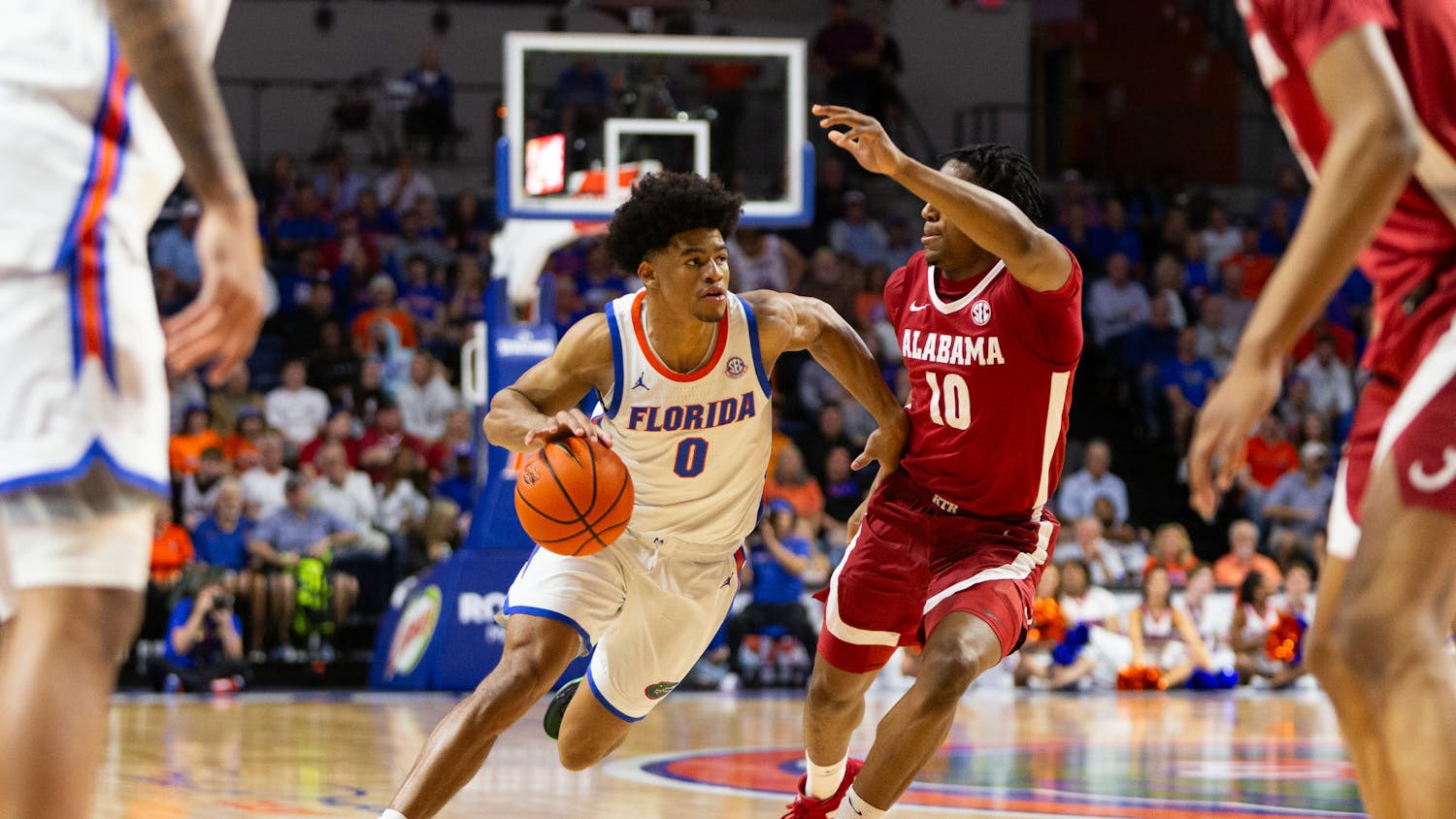 Gators men's basketball graduate student guard Zyon Pullin drives to the basket during the Florida Gators men's basketball game against the Alabama Crimson Tide on Tuesday, March 5, 2024. Photo by Ryan Friedenberg
