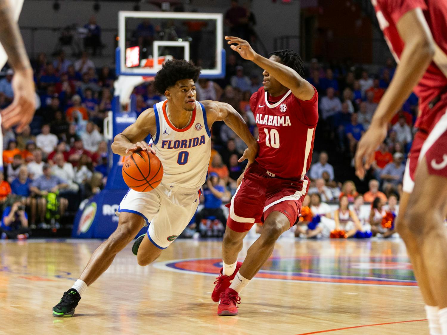 Gators men's basketball graduate student guard Zyon Pullin drives to the basket during the Florida Gators men's basketball game against the Alabama Crimson Tide on Tuesday, March 5, 2024. Photo by Ryan Friedenberg