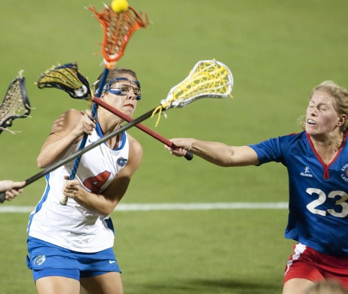 Florida junior attacker Kitty Cullen (left), who scored three goals in UF’s season-opening loss to North Carolina on Saturday, said the Gators did not play with enough intensity throughout the game after opening up an early two-goal lead.