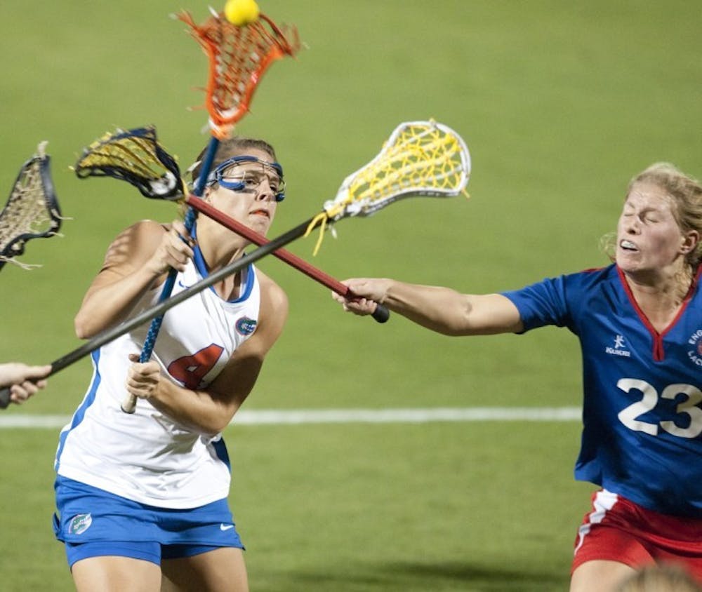 <p>Florida junior attacker Kitty Cullen (left), who scored three goals in UF’s season-opening loss to North Carolina on Saturday, said the Gators did not play with enough intensity throughout the game after opening up an early two-goal lead.</p>