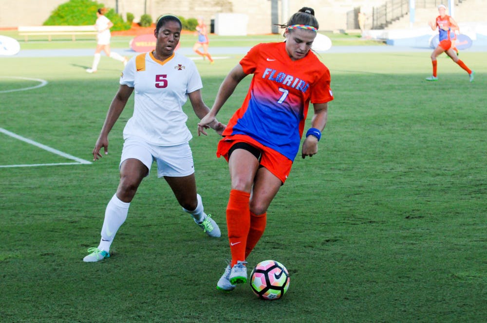 <p>Savannah Jordan dribbles the ball during Florida's 5-2 win over Iowa State on Aug. 19 at James G. Pressly Stadium.</p>