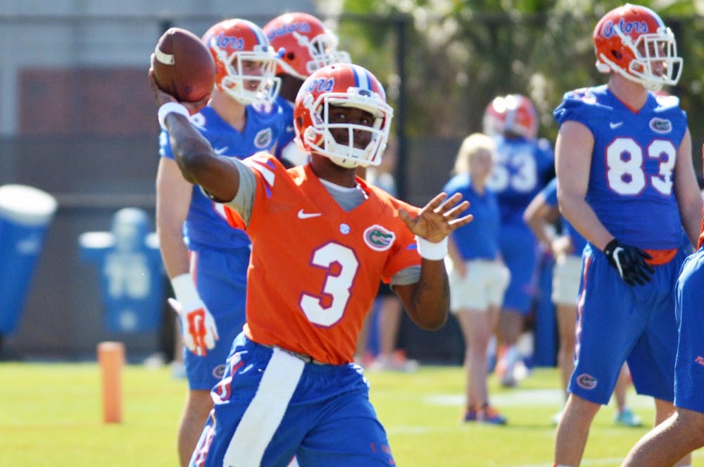 Treon Harris prepares to pass during practice on Monday.