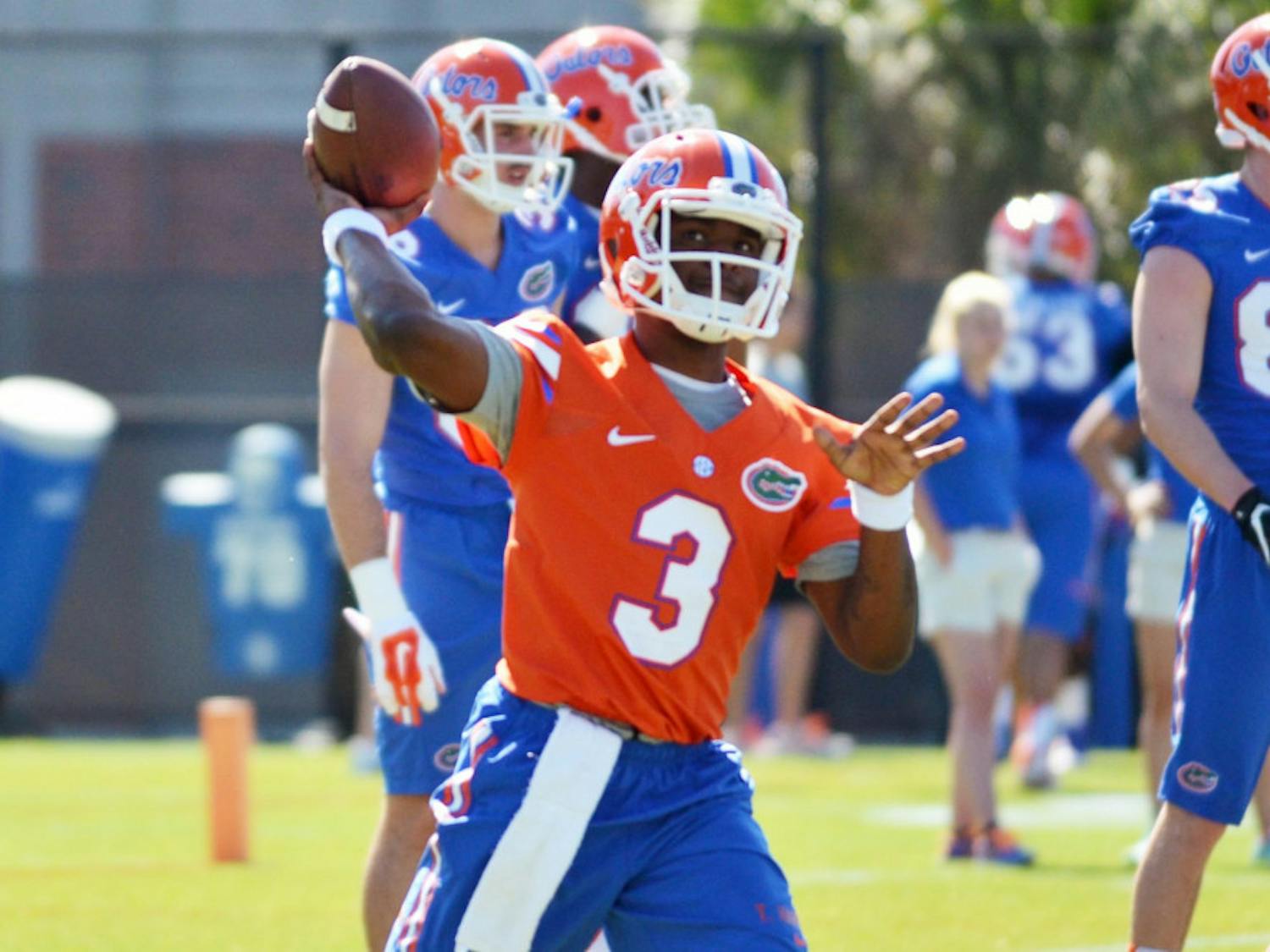 Treon Harris prepares to pass during practice on Monday.