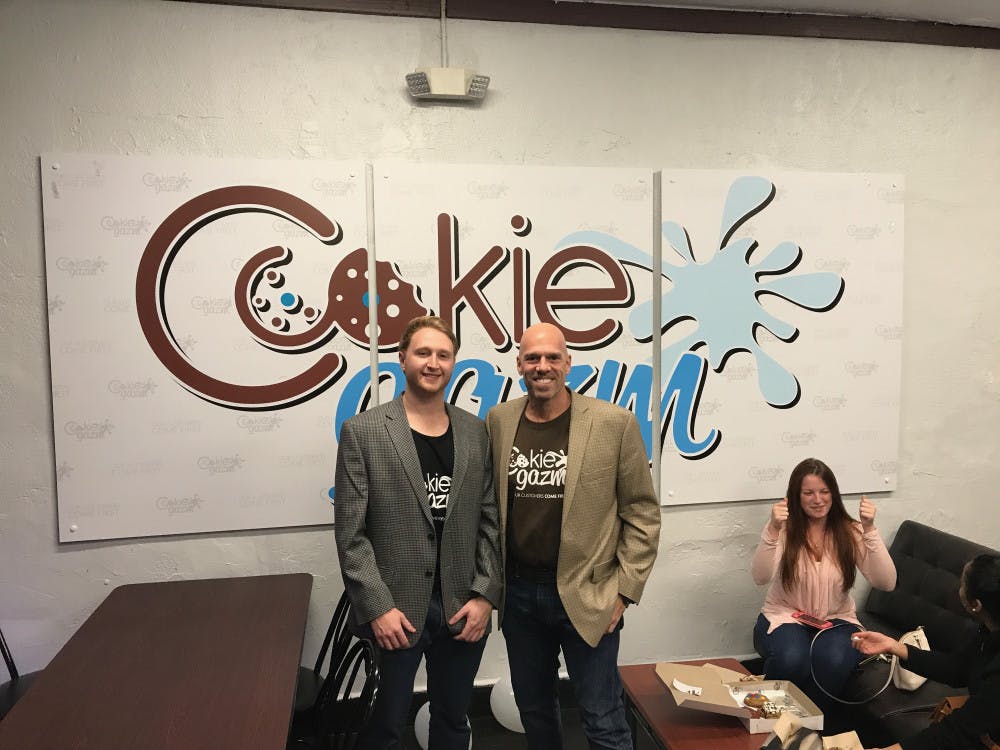 Aaron Seemann, owner, and Jose Benacerraf, partner and investor, celebrate the opening of Cookiegazm’s new store located in downtown Gainesville.
