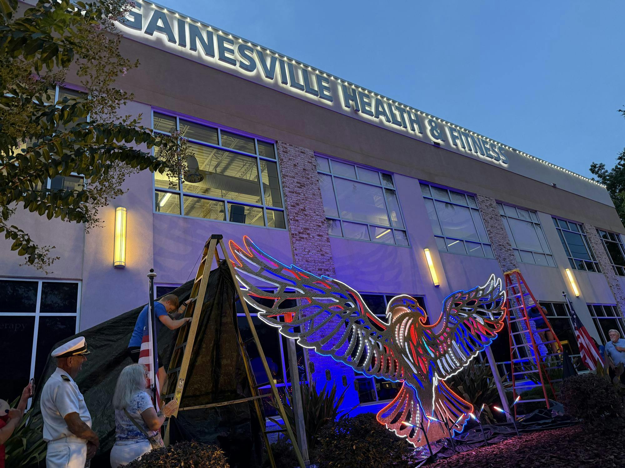 In front of Gainesville Health and Fitness, stands an illuminated eagle sculpture statue in honor of the 250th anniversary of the United States after its unveiling on June 30, in Gainesville, Fla.