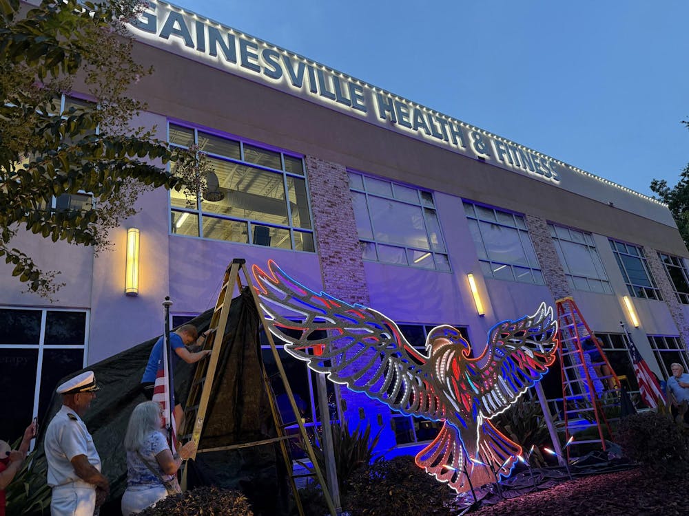 In front of Gainesville Health and Fitness, stands an illuminated eagle sculpture statue in honor of the 250th anniversary of the United States after its unveiling on June 30, in Gainesville, Fla.