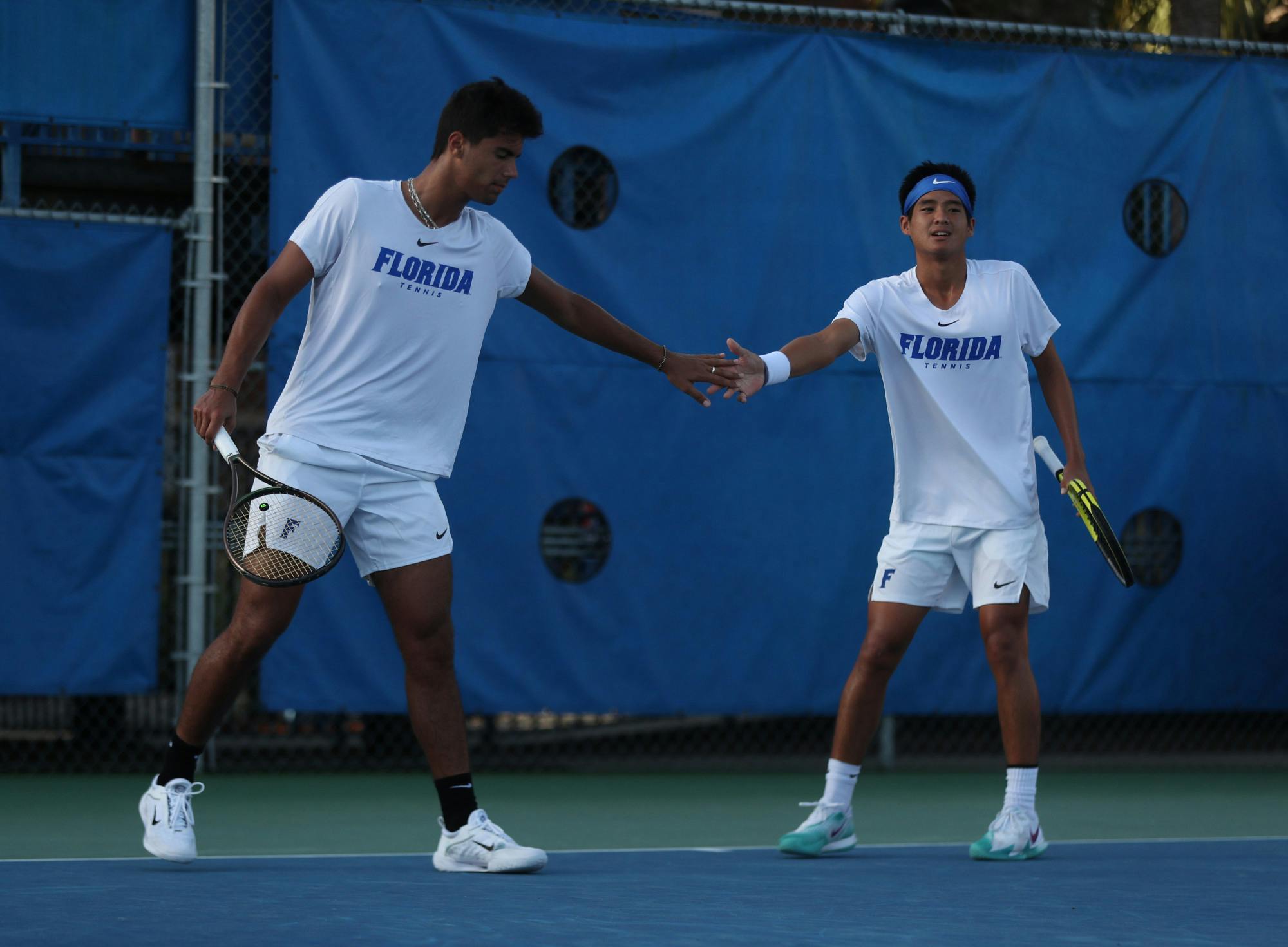 Florida tennis freshmen Tanapatt Nirundorn and Togan Tokac share the court at the Gator Fall Invite Sunday, Nov. 6, 2022. (Photo by Sydney Calle)