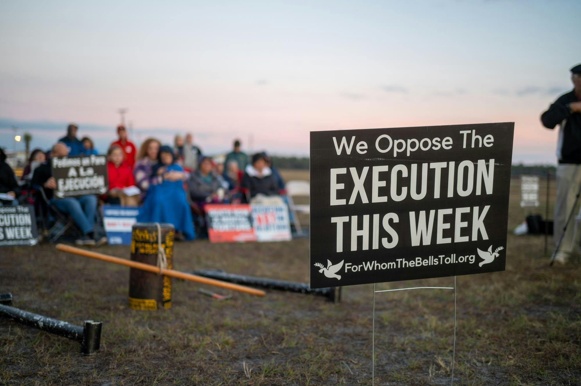 Protestors of the death penalty sit outside Florida State Prison and pray in opposition to the execution of Mark Allen Geralds. Geralds was executed in Raiford on Tuesday, Dec. 9, 2025.