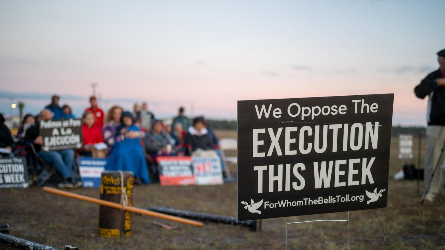 Protestors of the death penalty sit outside Florida State Prison and pray in opposition to the execution of Mark Allen Geralds. Geralds was executed in Raiford on Tuesday, Dec. 9, 2025.