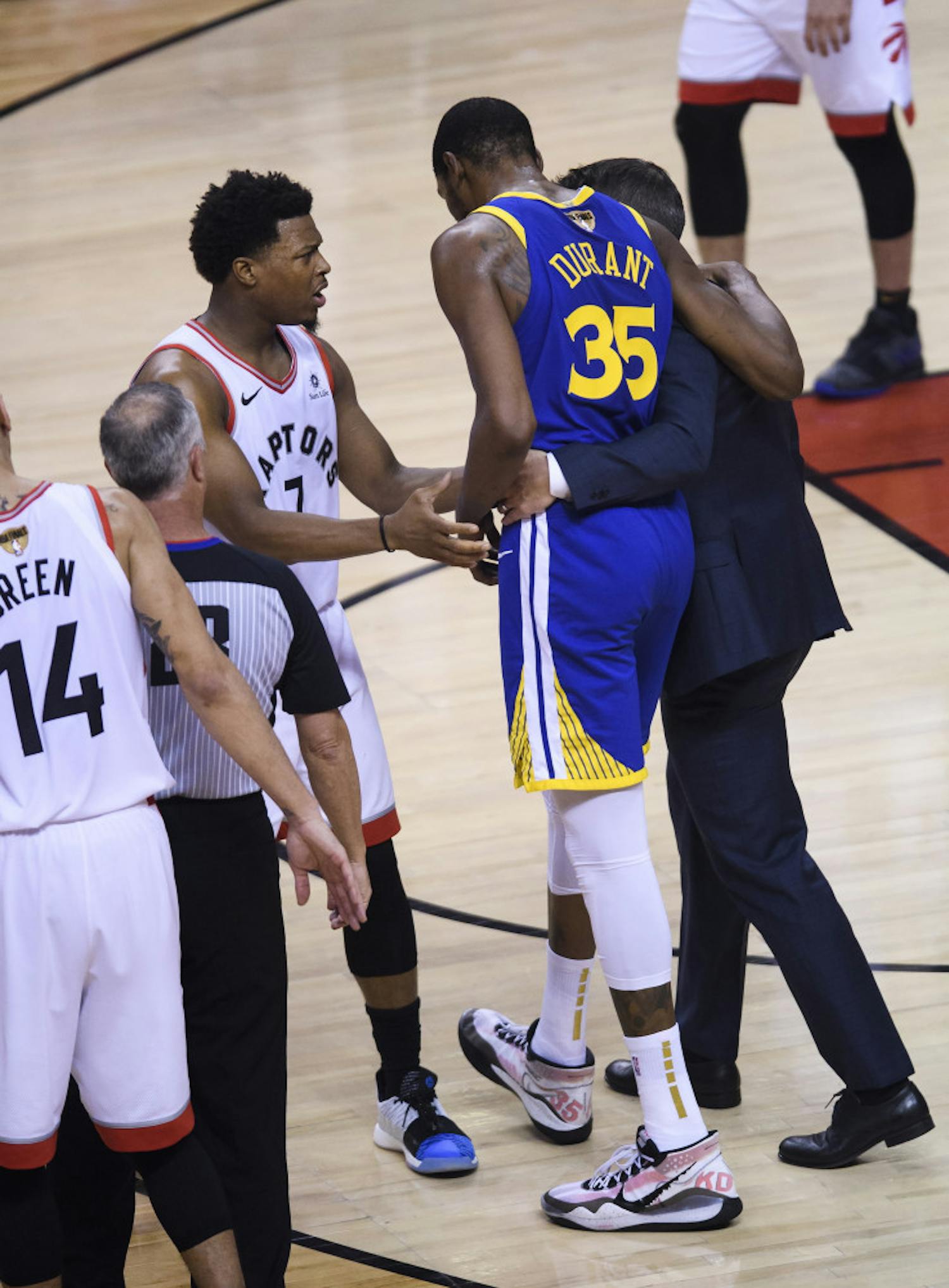 Warriors small forward Kevin Durant limps off the court after rupturing his Achilles in Game 5 of the NBA Finals on Monday night.