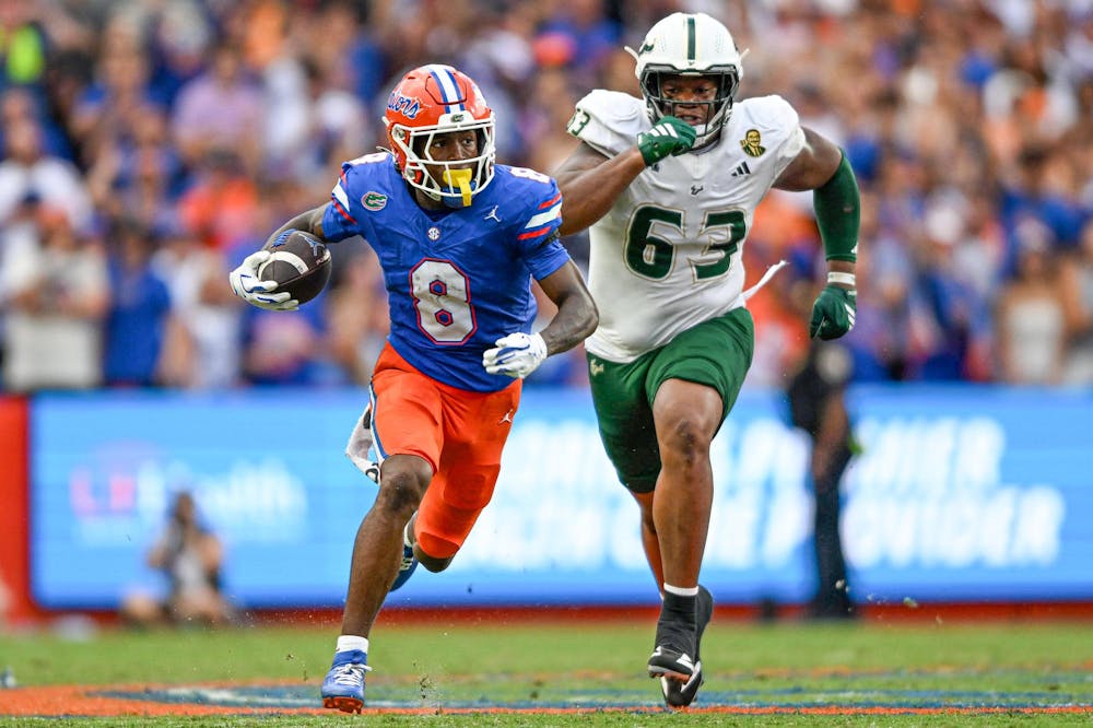 Florida Gators wide receiver Vernell Brown III (8) runs with the ball in a football game between the South Florida Bulls and the Florida Gators on Sept. 6, 2025, at Ben Hill Griffin Stadium in Gainesville, Fla.