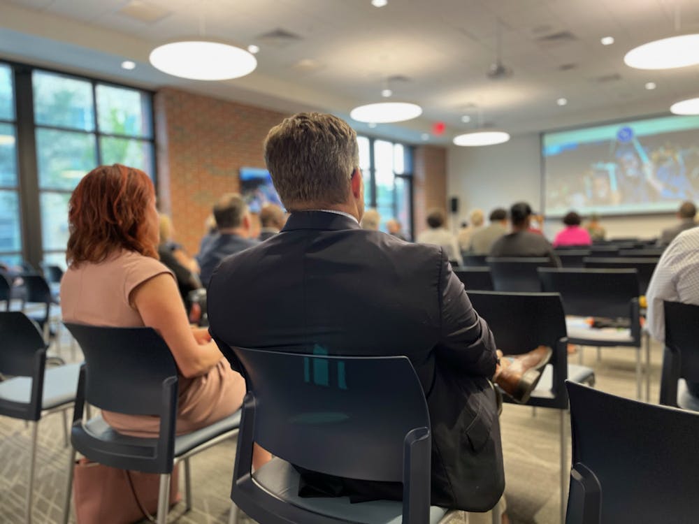Community members, Santa Fe College faculty and students listen to SF President Paul Broadie II deliver the opening address of the East Gainesville Initiative Community Forum at the SF Charles L. Blount Center Oct. 5.