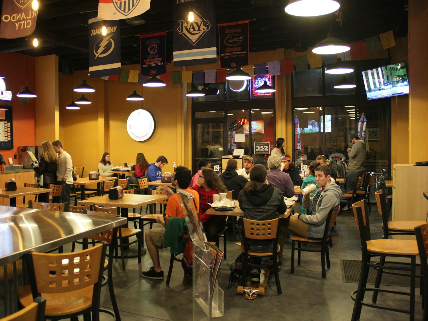 About 25 customers dine at Burrito Bros. Taco Co., located at 1402 W. University Ave., on Sunday night. The restaurant has been serving the Gainesville community since 1976. 