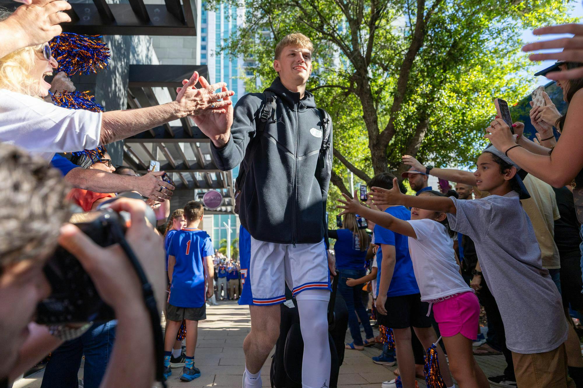 Florida forward Thomas Haugh walks through GatorWalk, Sunday, March 22, 2026, in front of the JW Marriott, in Tampa, Fla.