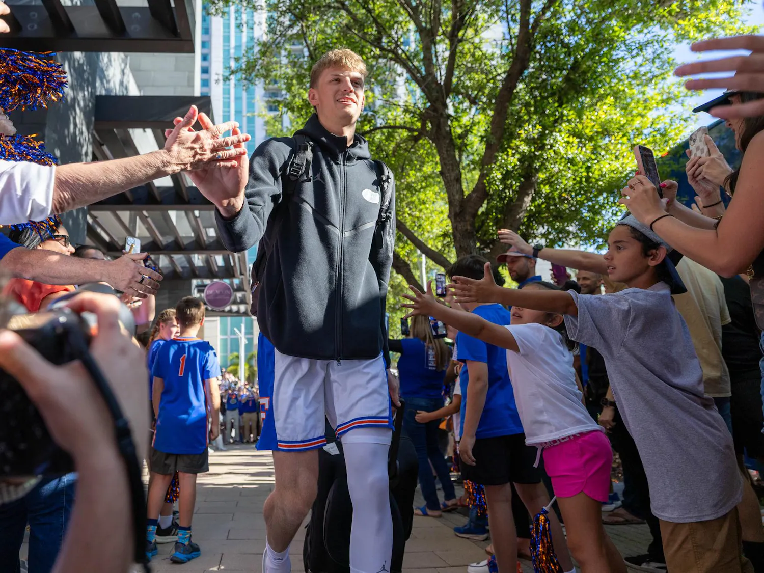 Florida forward Thomas Haugh walks through GatorWalk, Sunday, March 22, 2026, in front of the JW Marriott, in Tampa, Fla.