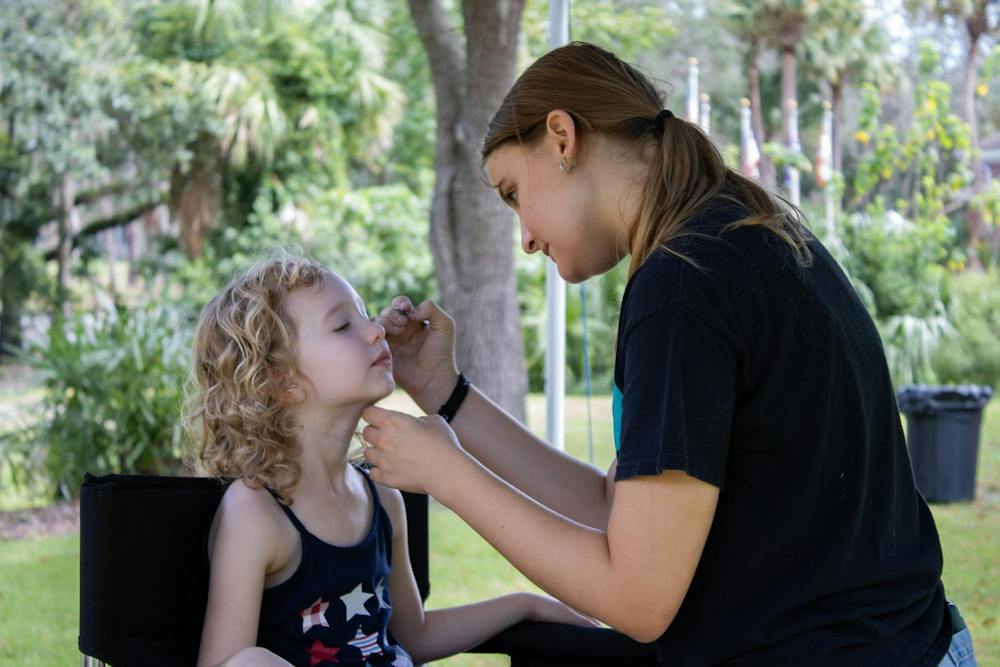A child gets face paint at the 40th Anniversary Celebration at Alachua County Headquarters Library, Saturday, Oct. 3, 2026, in Gainesville, Fla.