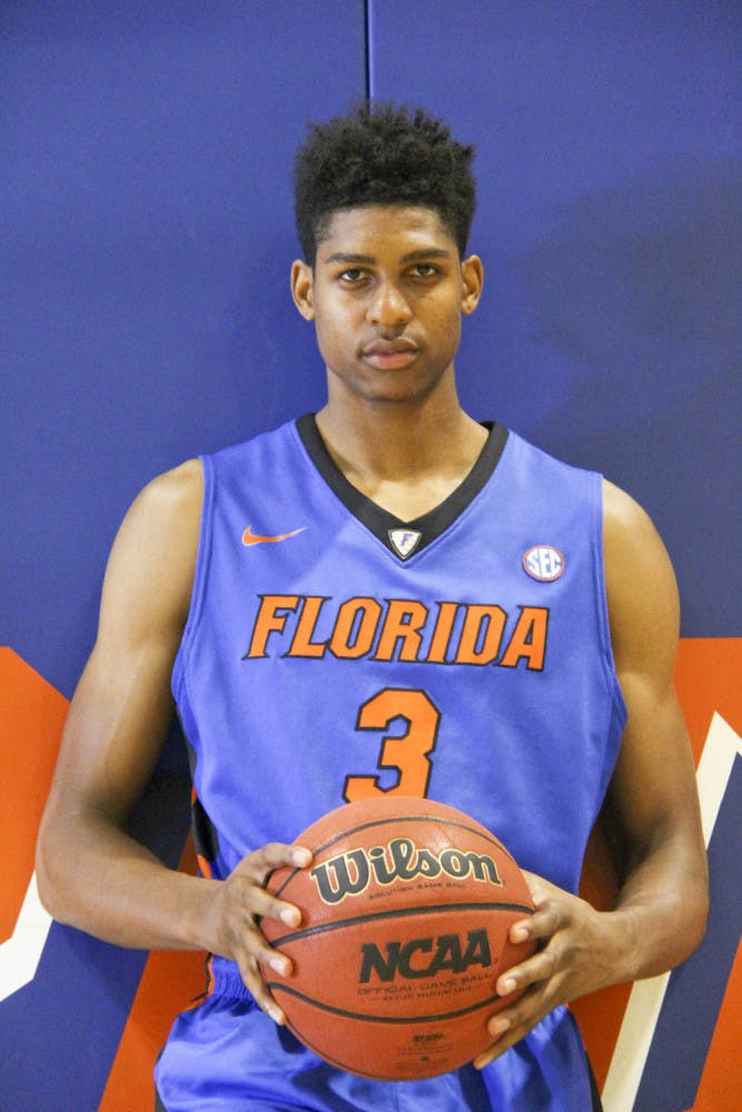 Devin Robinson poses during the Florida men's basketball team's media day