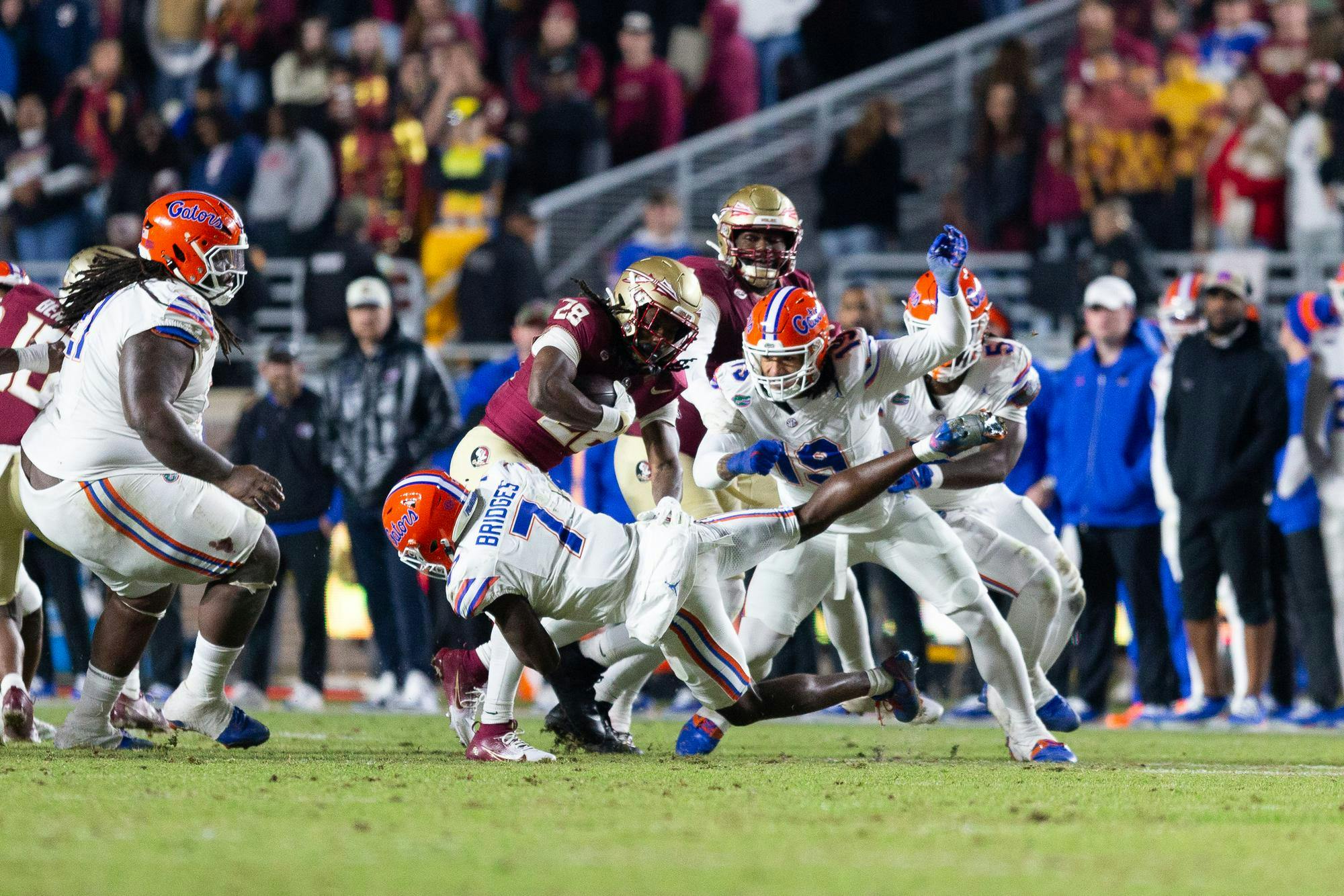 Florida Gators defensive back Trikweze Bridges (7) makes a stop during the second half of the team’s game against the Flordia State Seminoles at Doak S. Campbell Stadium on Saturday, Nov. 30, 2024.