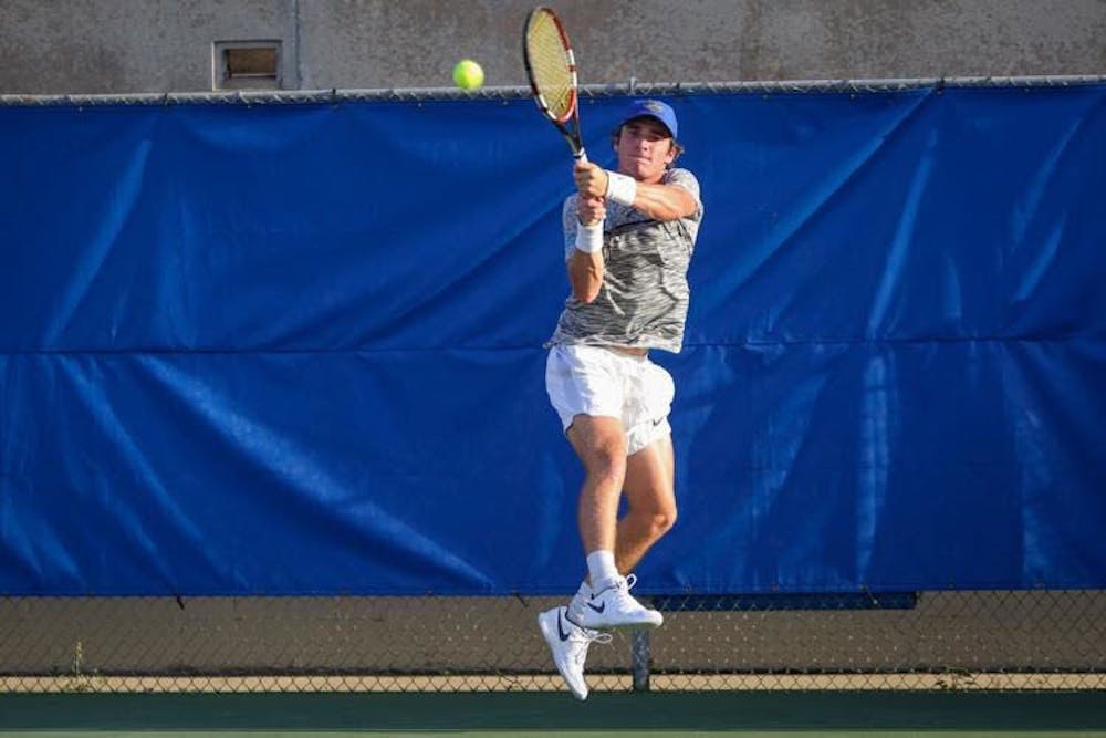 <p>Sophomore Oliver Crawford has a 13-7 record in singles play this season.</p>