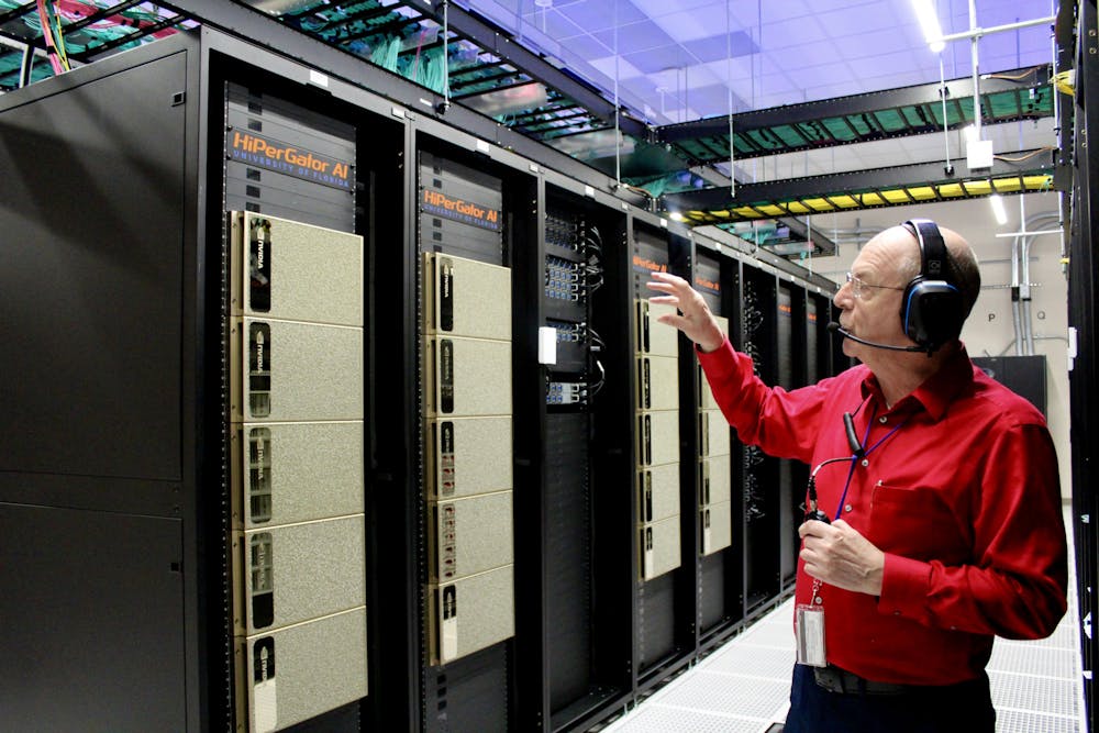 UFIT Research Computing Senior Director Erik Deumens leads a tour of UF's supercomputer, HiPerGator, on Wednesday, Dec. 18, 2025.