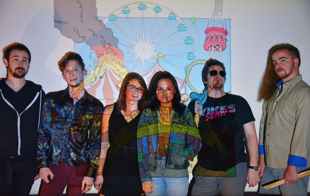 <p><span>(L-R) Sooza Brass Band consists of Brian Burwell (trombone), Ryan Gamberino (saxophone), Adrienne Widener (trumpet), Bianca Maesa (sousaphone), Ben Elgan (trumpet) and Austin DiVito (drums). The band released their debut album, Bananaland, in December.</span></p>