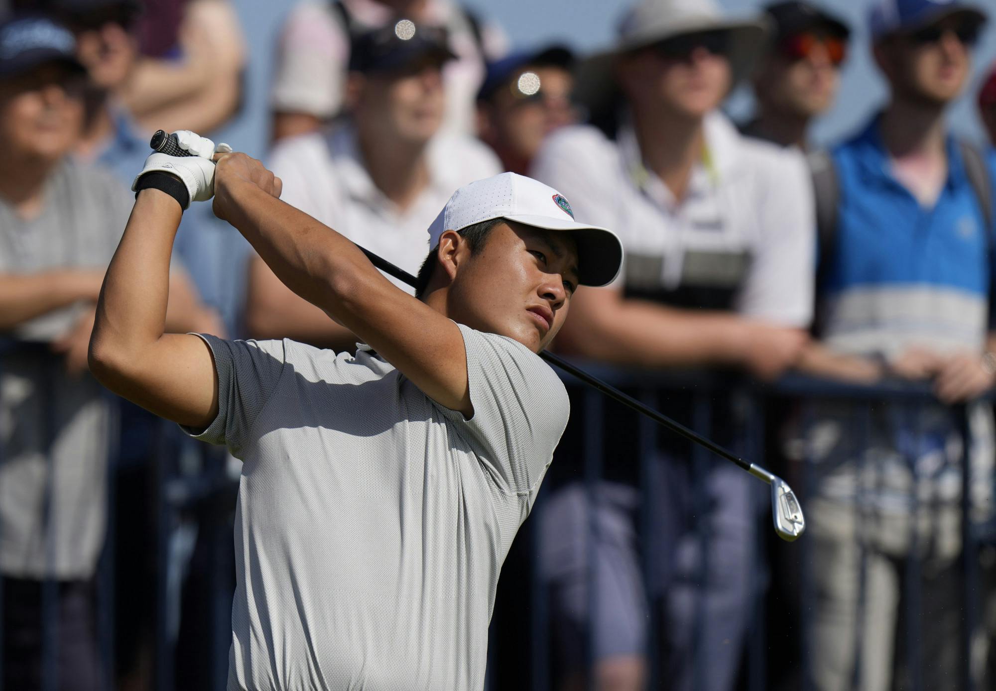 China's Yuxin Lin plays his tee shot on the 3rd hole during the third round of the British Open Golf Championship at Royal St George's golf course Sandwich, England, Saturday, July 17, 2021. (AP Photo/Alastair Grant)