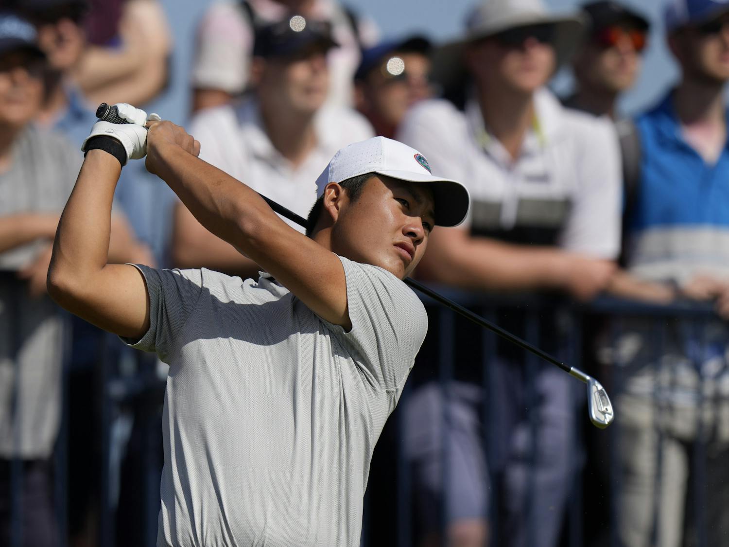 China's Yuxin Lin plays his tee shot on the 3rd hole during the third round of the British Open Golf Championship at Royal St George's golf course Sandwich, England, Saturday, July 17, 2021. (AP Photo/Alastair Grant)