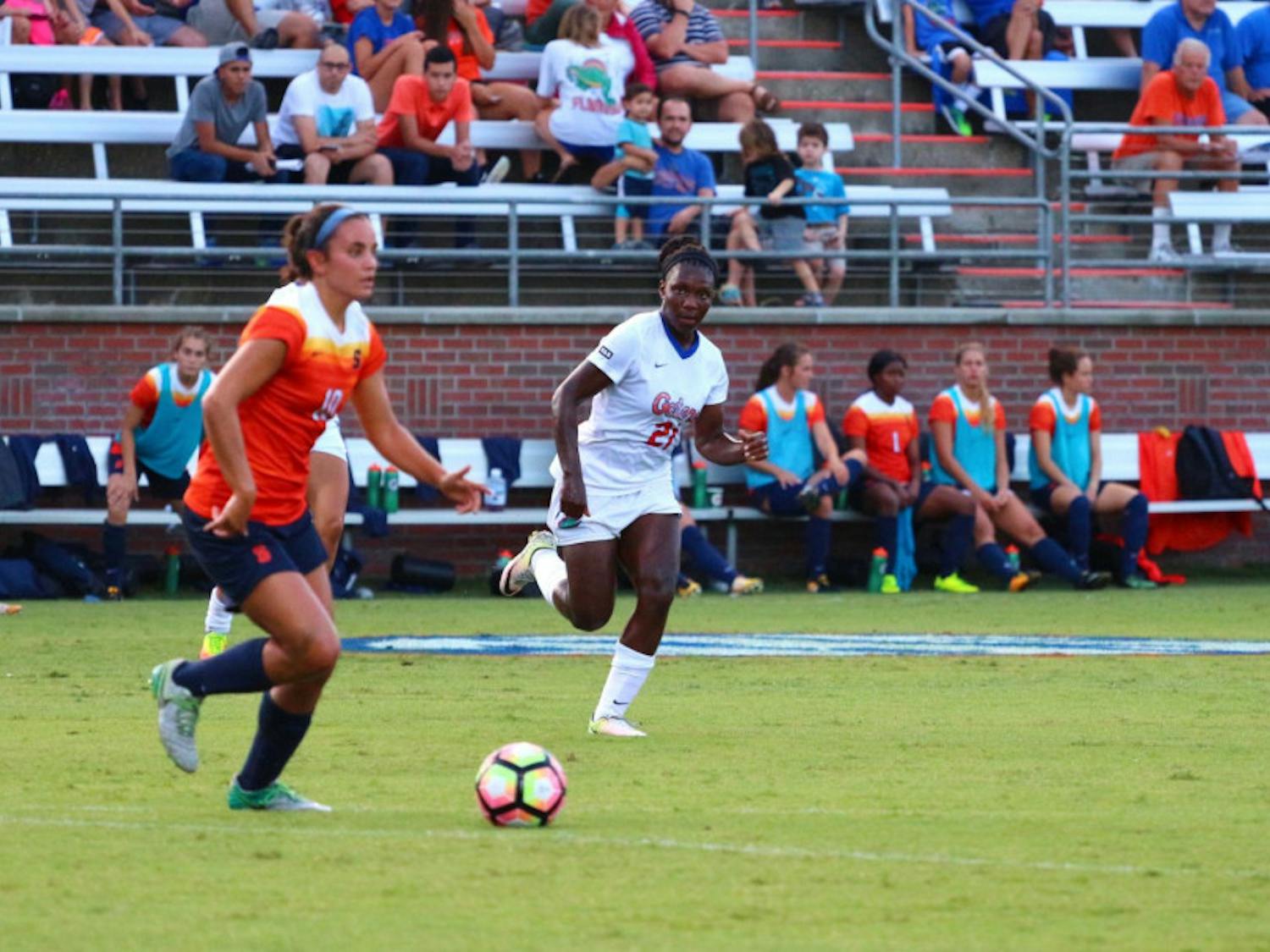 Deanne Rose chases a Syracuse player with possession of the ball during Florida's 2-1 win against the Orange on Aug. 27 at Donald R. Dizney Stadium.