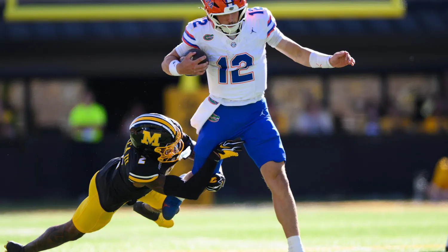 Florida quarterback Aaron Philo (12) rushes during the first half of an NCAA college football game against Missouri, Saturday, Oct. 3, 2026, in Columbia, Mo.