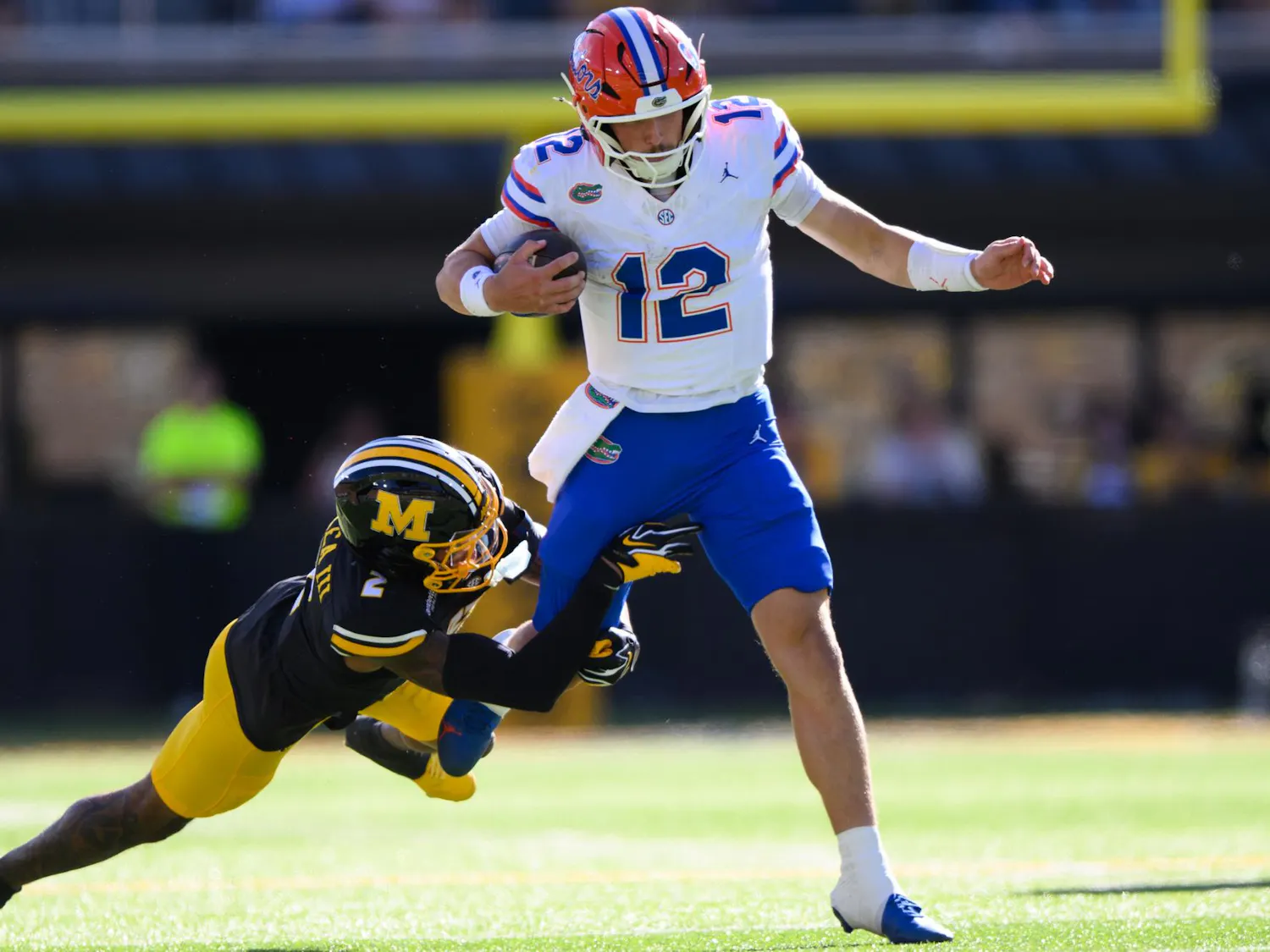 Florida quarterback Aaron Philo (12) rushes during the first half of an NCAA college football game against Missouri, Saturday, Oct. 3, 2026, in Columbia, Mo.